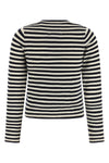 the n°451 lisa top by extreme cashmere redefines the codes of everyday knitwear