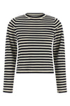 the n°451 lisa top by extreme cashmere redefines the codes of everyday knitwear