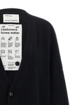 the extreme cashmere n°517 simo cardigan redefines knitwear volumes through a