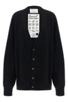 the extreme cashmere n°517 simo cardigan redefines knitwear volumes through a