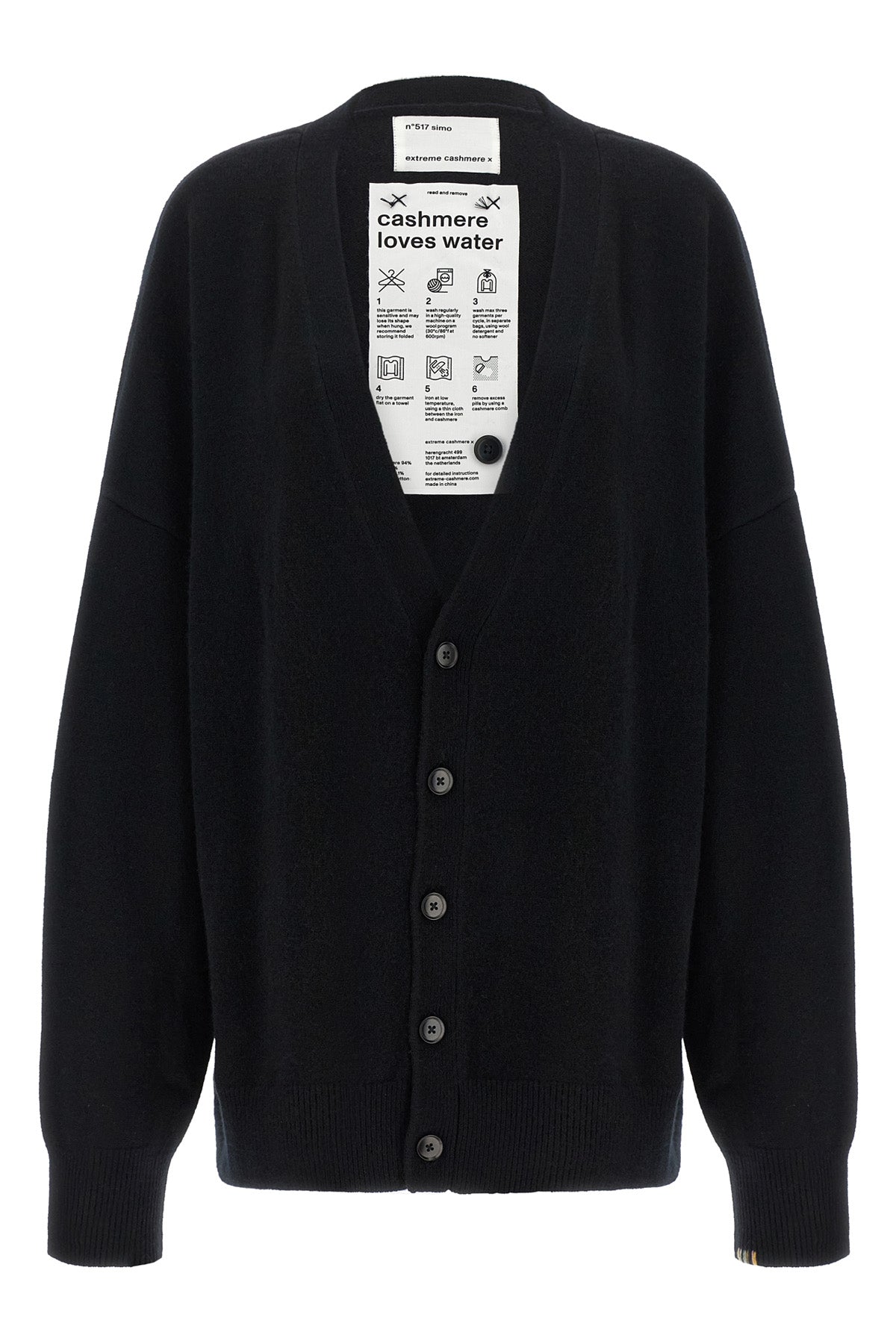 the extreme cashmere n°517 simo cardigan redefines knitwear volumes through a