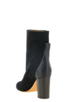 odissi dot ankle boots have a structured silhouette in fine black calf suede