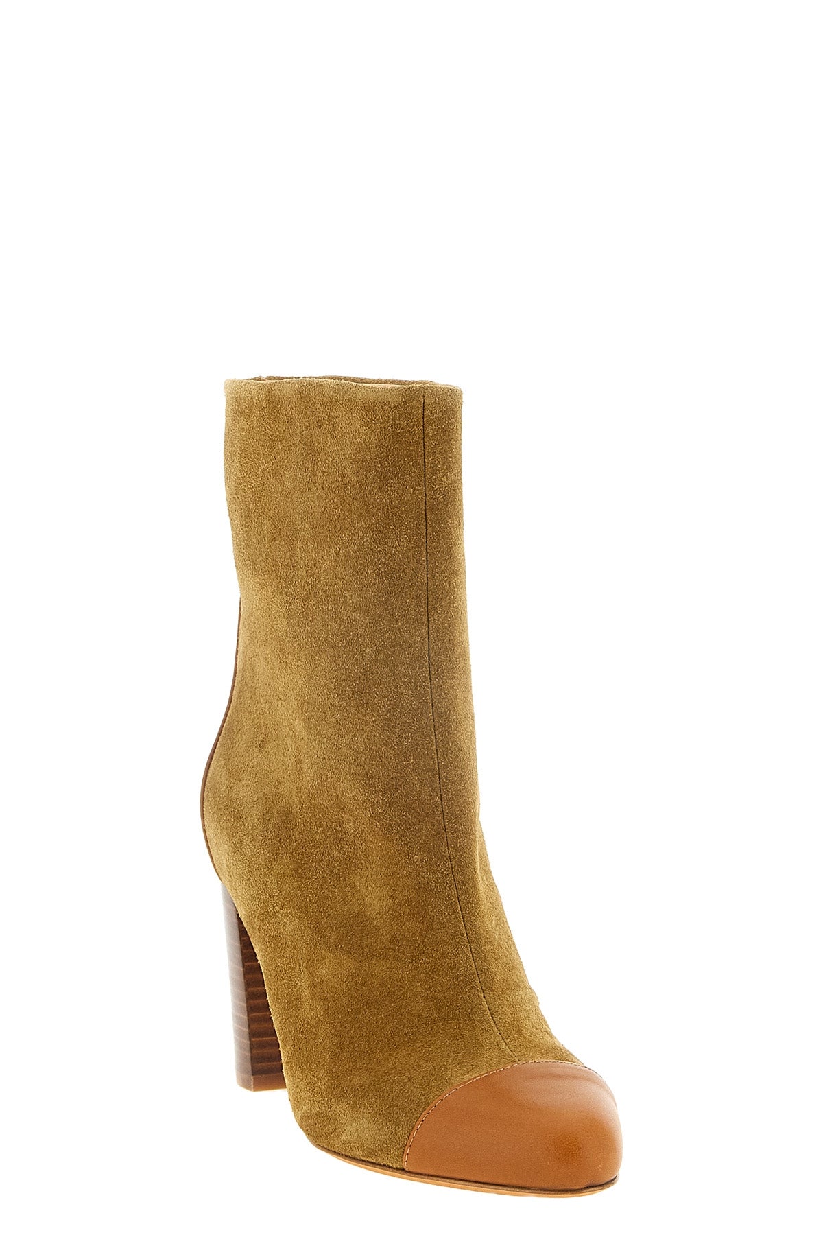 odissi dot ankle boots have a structured ankle silhouette