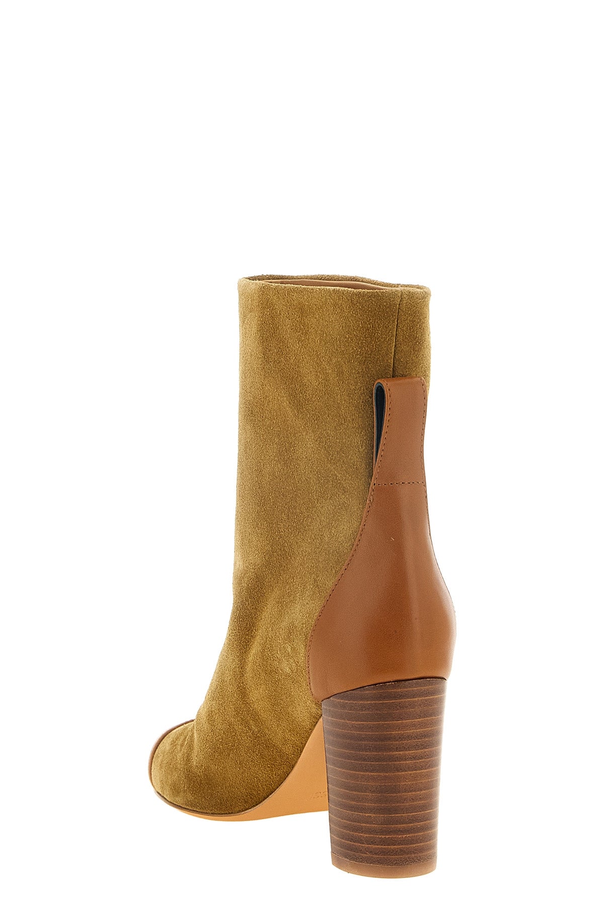 odissi dot ankle boots have a structured ankle silhouette