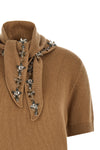 the prada short-sleeved sweater redefines luxury knitwear through sophisticated