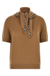 the prada short-sleeved sweater redefines luxury knitwear through sophisticated