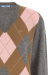 the prada sweater reinterprets the classic codes of knitwear through a pure cash