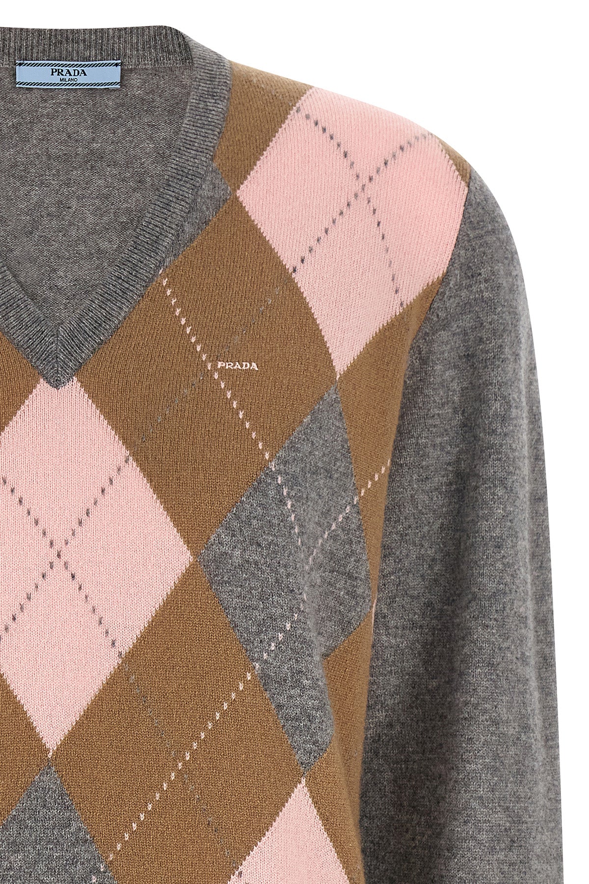 the prada sweater reinterprets the classic codes of knitwear through a pure cash