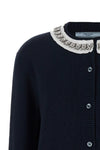 the prada cardigan in fine navy blue yarn embodies timeless elegance through une