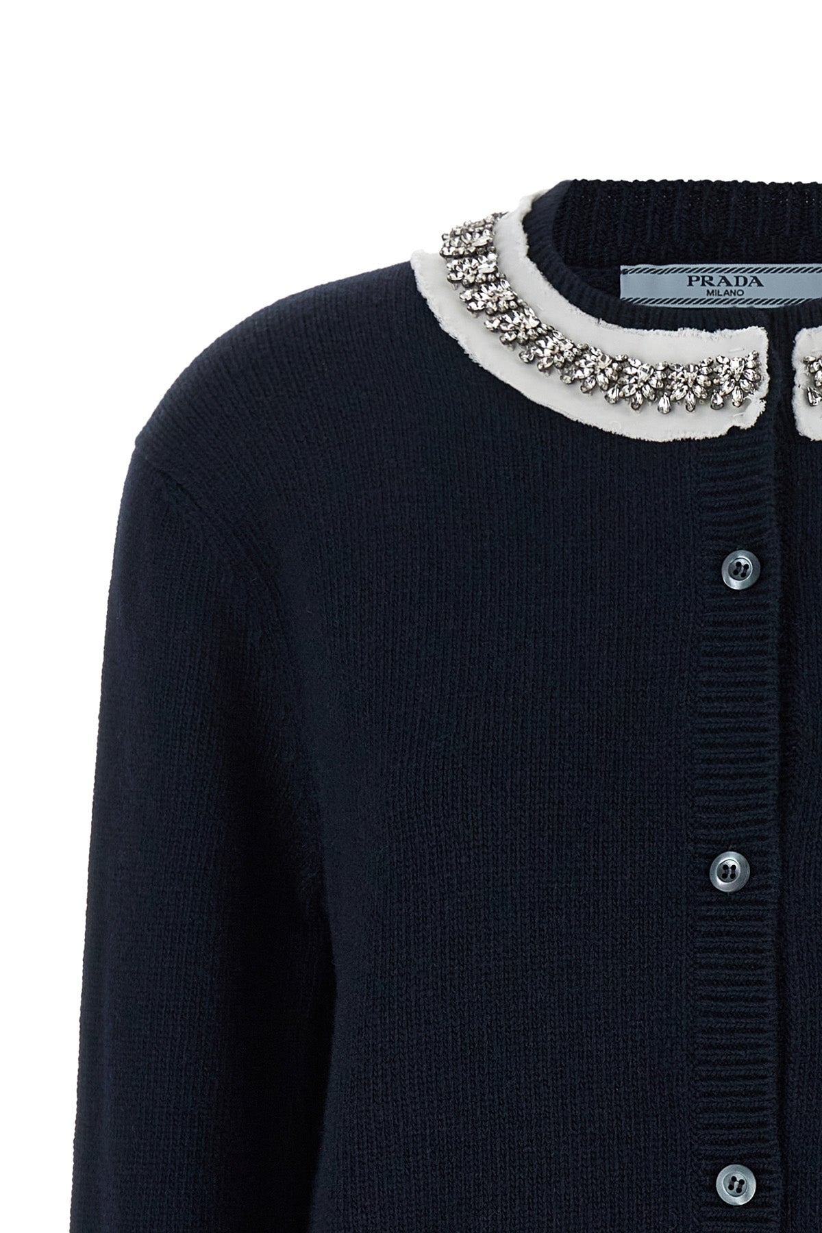 the prada cardigan in fine navy blue yarn embodies timeless elegance through une