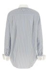 the prada cotton poplin shirt redefines the codes through a contemporary aesthet