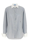 the prada cotton poplin shirt redefines the codes through a contemporary aesthet