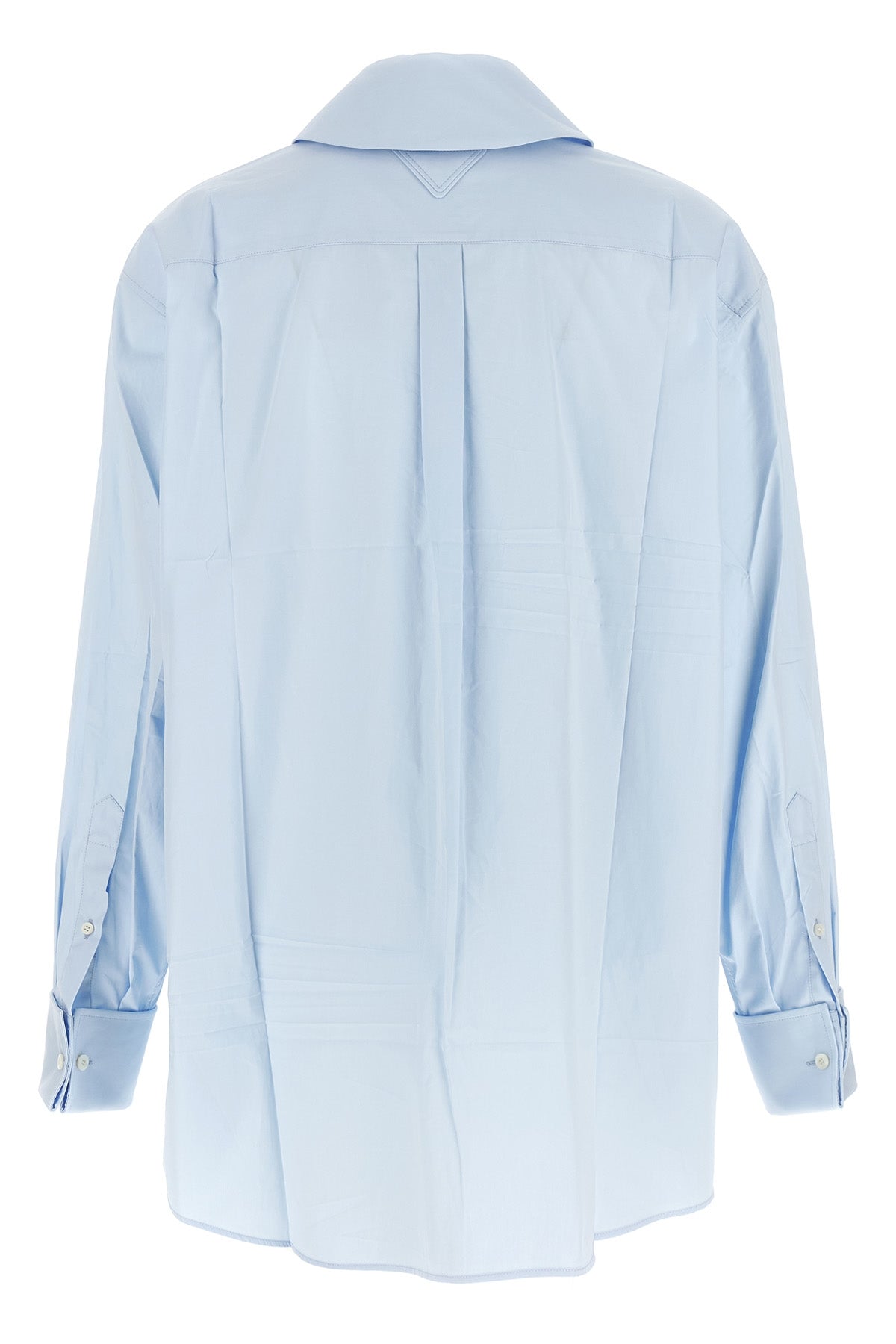 the prada pure cotton shirt redefines the codes of classic tailoring through rel