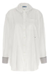 the prada poplin shirt redefines classic tailoring through unexpected details an