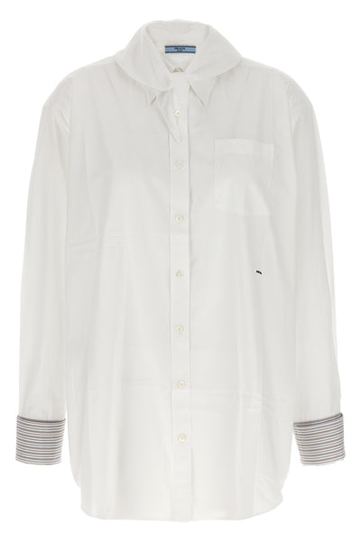 the prada poplin shirt redefines classic tailoring through unexpected details an