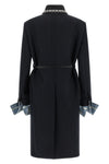 the prada pure virgin wool coat defines a rigorous and elegant sartorial model