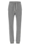 balmain sporty trousers redefine the codes of leisure clothing through a manufac