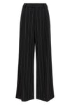 federica bonifaci trousers redefine the codes of classic tailoring through fluid