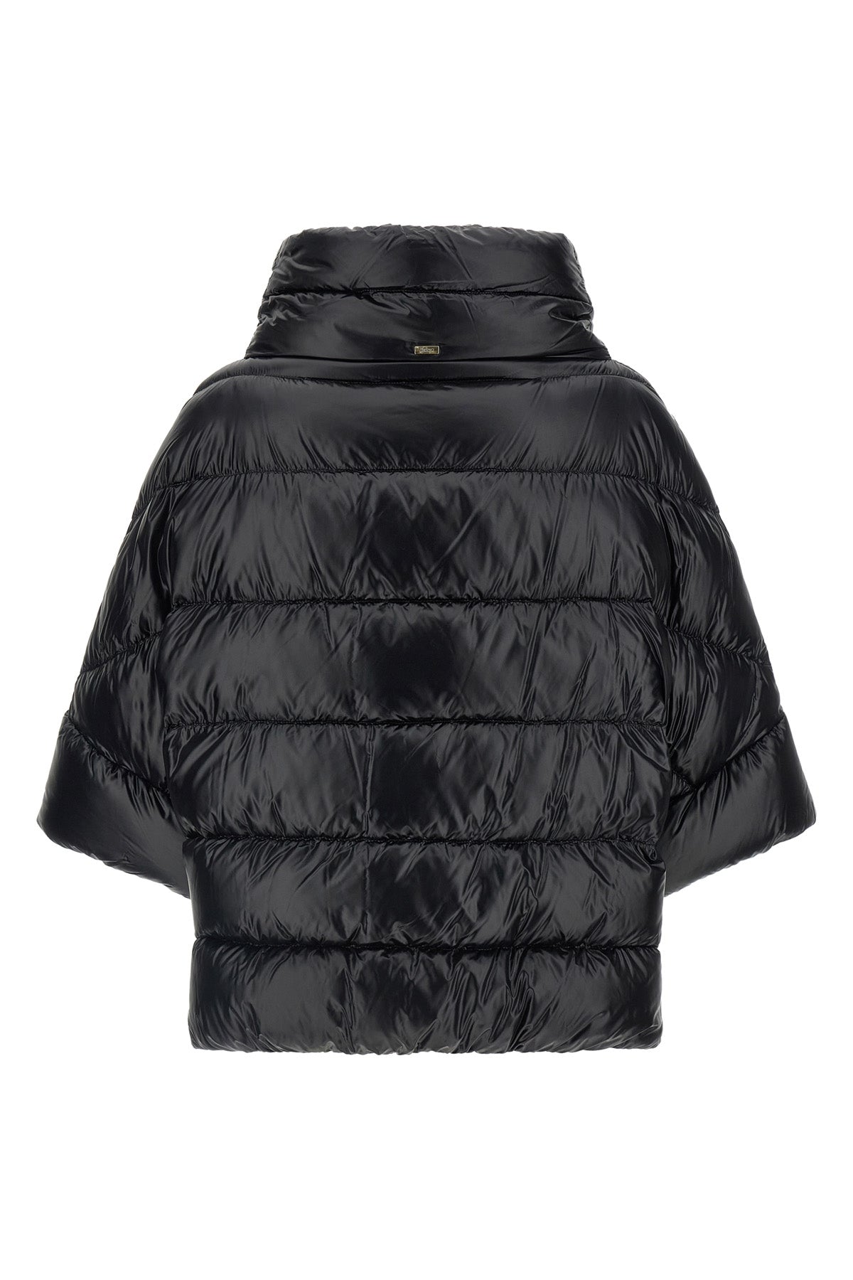 the herno hood redefines the volumes of outerwear through a flared silhouette