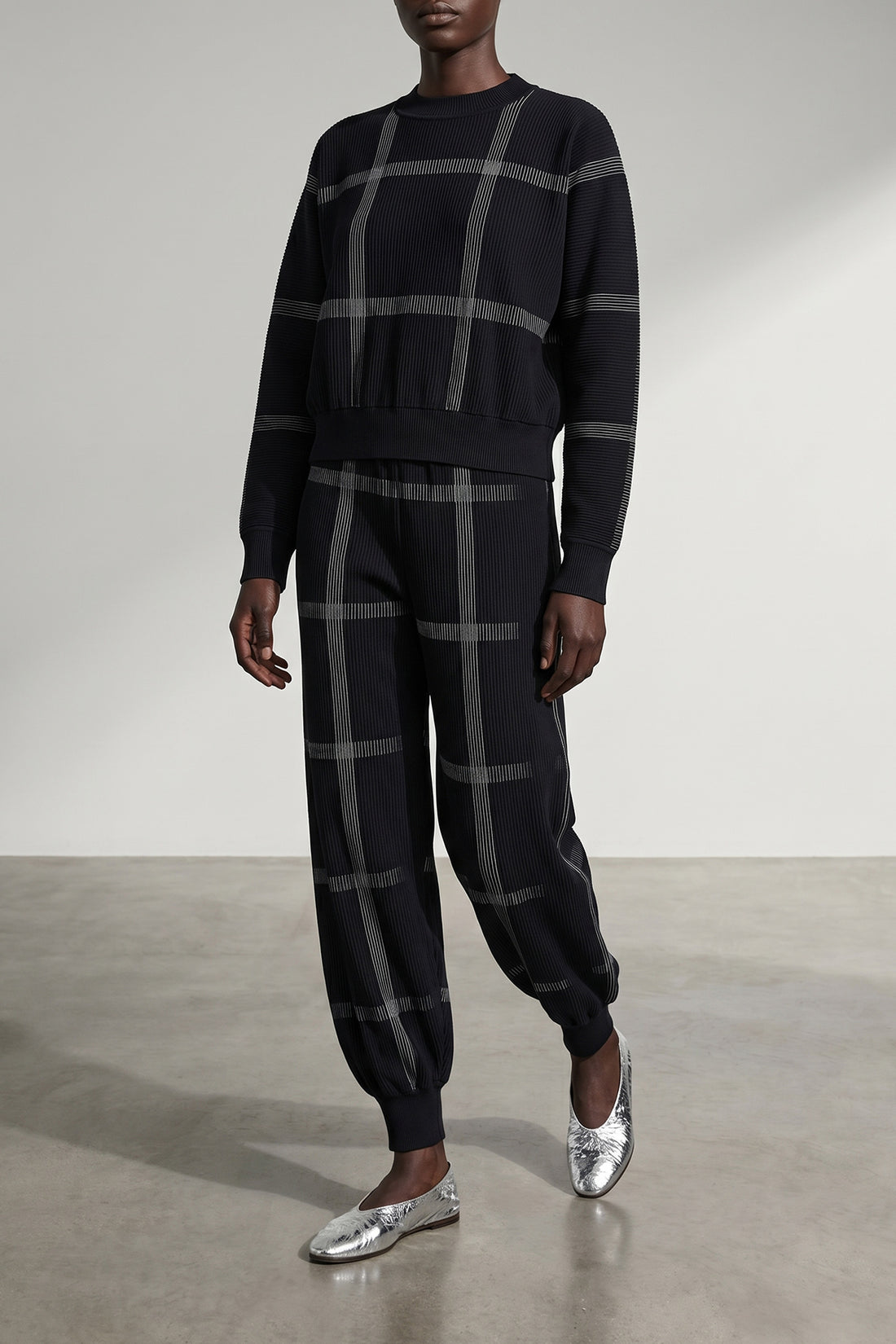 PLEATS PLEASE ISSEY MIYAKE OS crossing knit sweater in ribbed knitted fabric