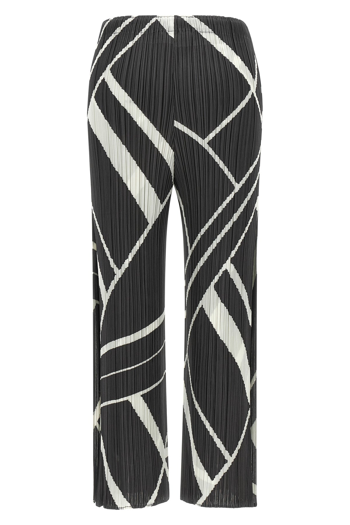 the fold line pleats please pants redefine the silhouette through a rigorous a