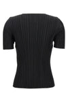 the basics top by pleats please issey miyake defines the silhouette through th