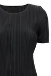 the basics top by pleats please issey miyake defines the silhouette through th