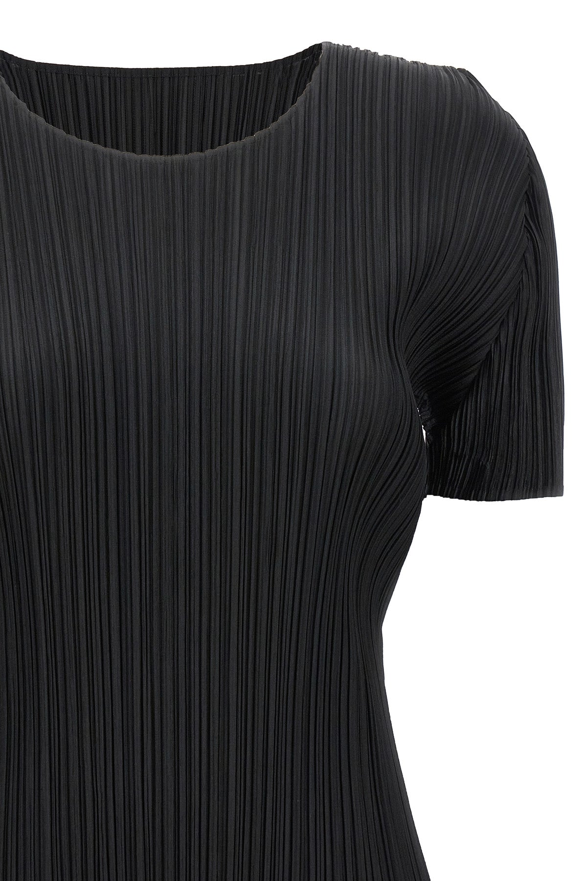 the basics top by pleats please issey miyake defines the silhouette through th