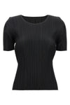 the basics top by pleats please issey miyake defines the silhouette through th