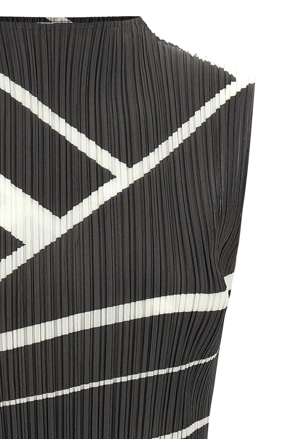 the fold line issey miyake pleats please blouse defines a new concept of volum