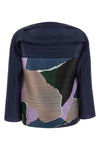 the surprise! pleats please blouse redefines volumes through a masterful pleat