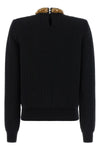 the balmain sweater in cashmere and virgin wool blend defines a structured and s