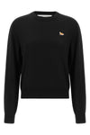 the maison kitsuné crew neck sweater embodies the essence of everyday luxury thr