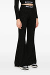 logo tape lurex knit pants