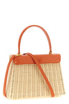the daniele amato queen rattan handbag defines a structured aesthetic through th