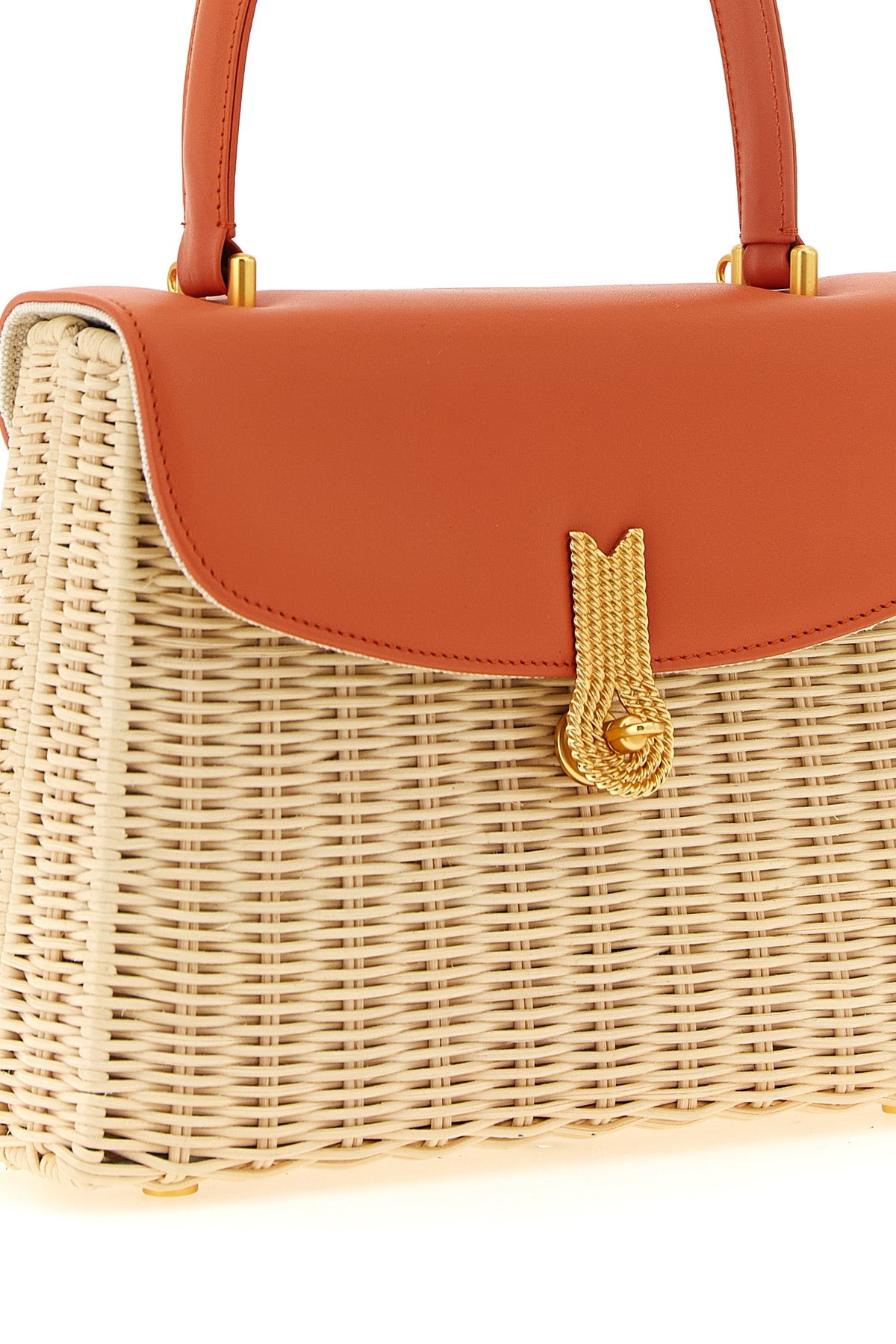 the daniele amato queen rattan handbag defines a structured aesthetic through th