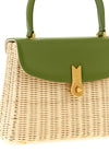 the daniele amato queen rattan handbag defines a material aesthetic through the