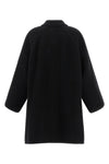 the row ina coat redefines the codes of outerwear through sculptural volumes and