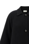 the row ina coat redefines the codes of outerwear through sculptural volumes and