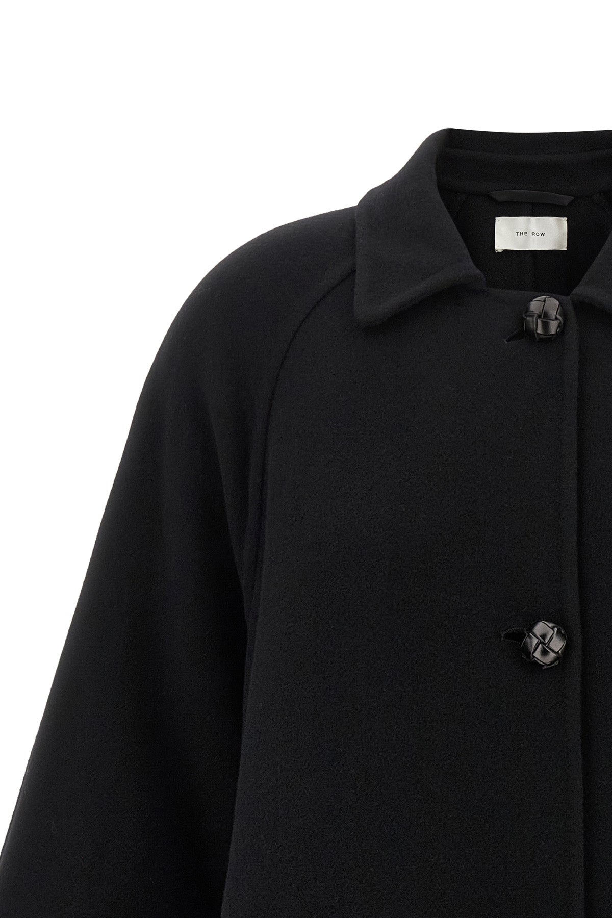 the row ina coat redefines the codes of outerwear through sculptural volumes and
