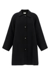 the row ina coat redefines the codes of outerwear through sculptural volumes and
