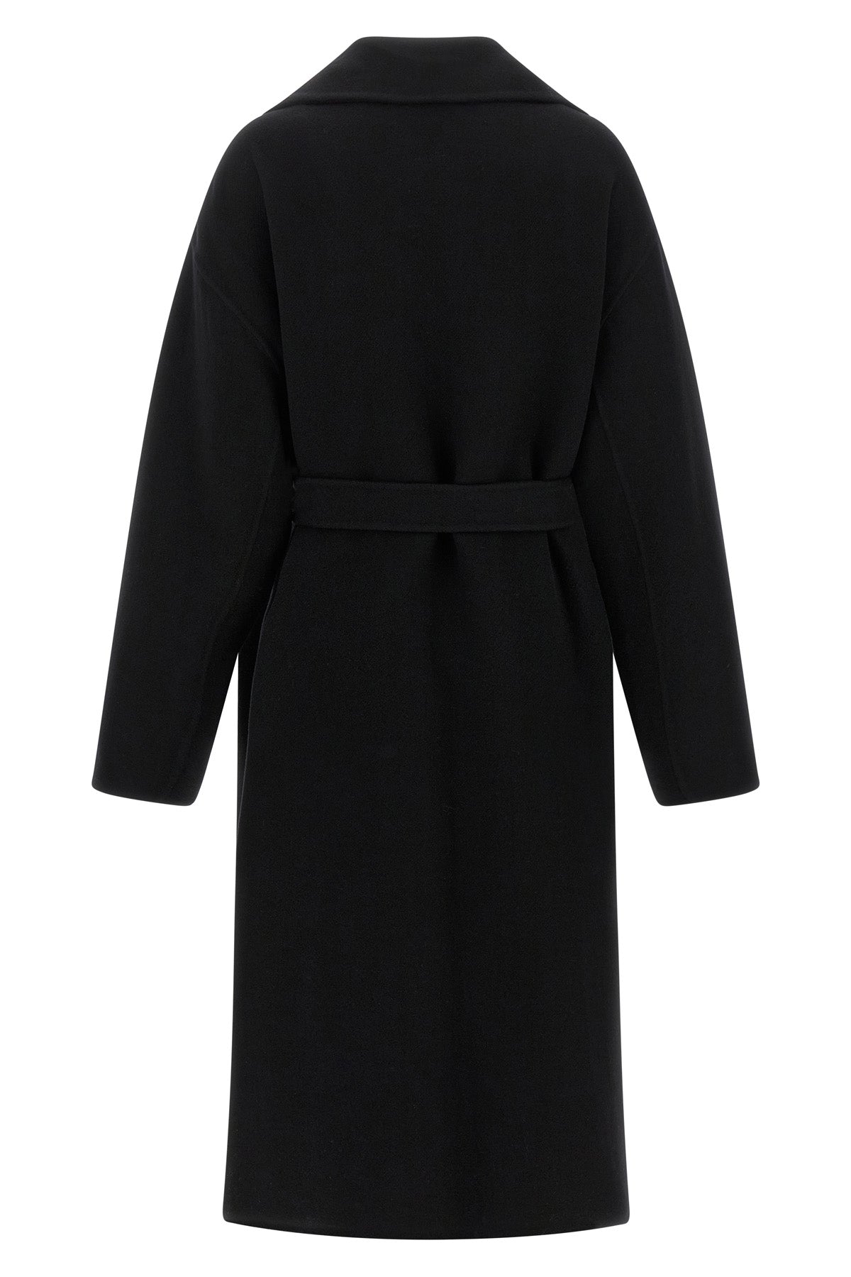 the row ciara coat redefines winter elegance through relaxed volumes and impecca