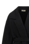 the row ciara coat redefines winter elegance through relaxed volumes and impecca