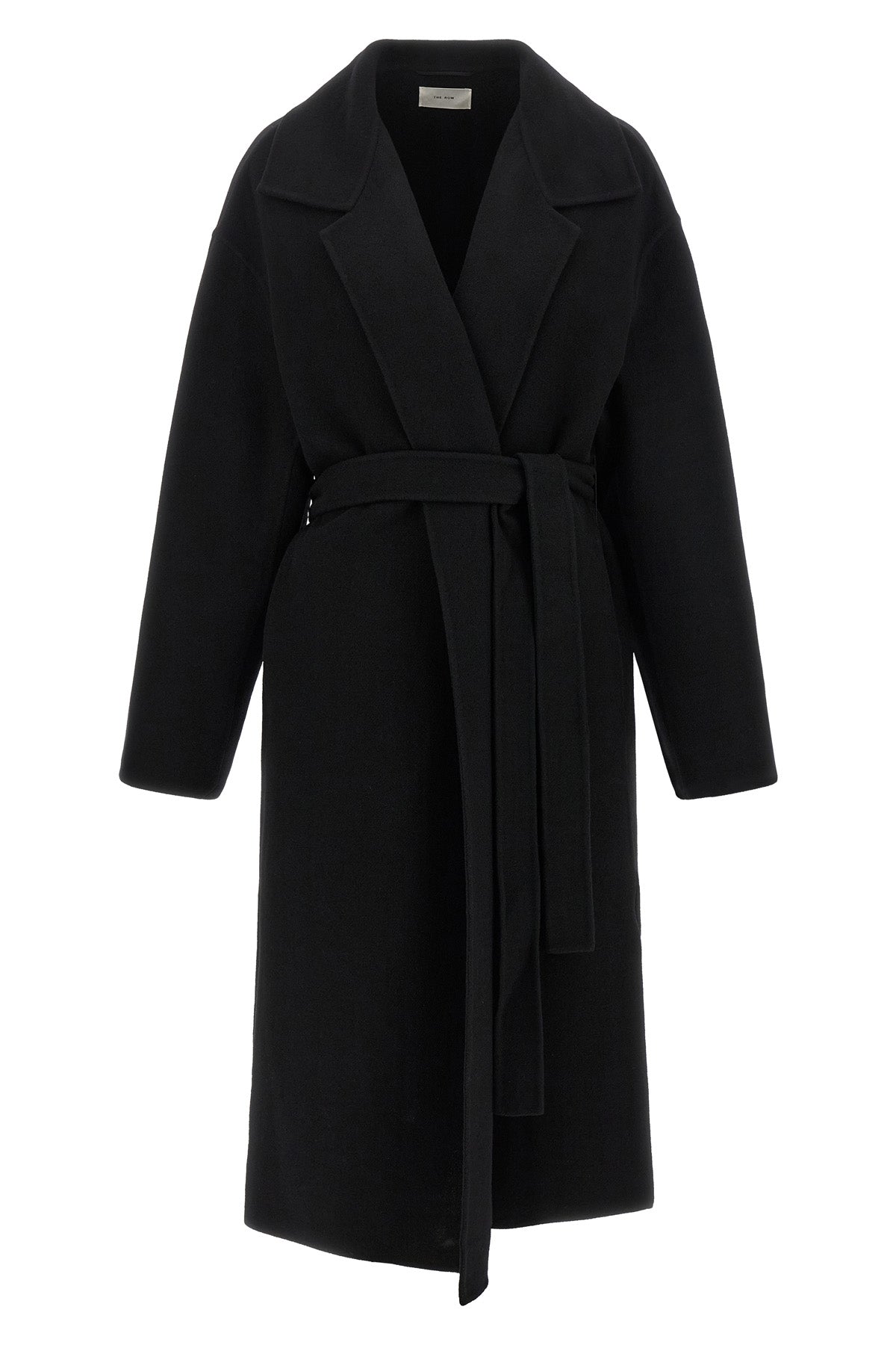 the row ciara coat redefines winter elegance through relaxed volumes and impecca