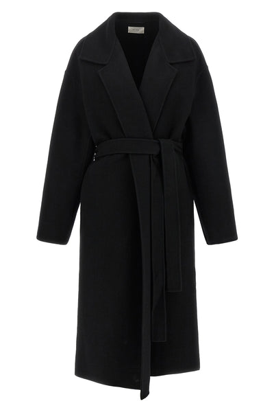the row ciara coat redefines winter elegance through relaxed volumes and impecca