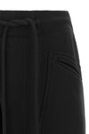 the r13 tracksuit pants redefine loungewear through bold proportions and a decon