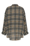 the r13 shirt redefines casual tailoring through a deconstructed aesthetic
