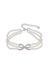 white adjustable choker necklace with bow, pearls, and rhinestones