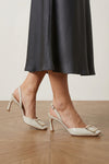 trompette patent leather slingbacks