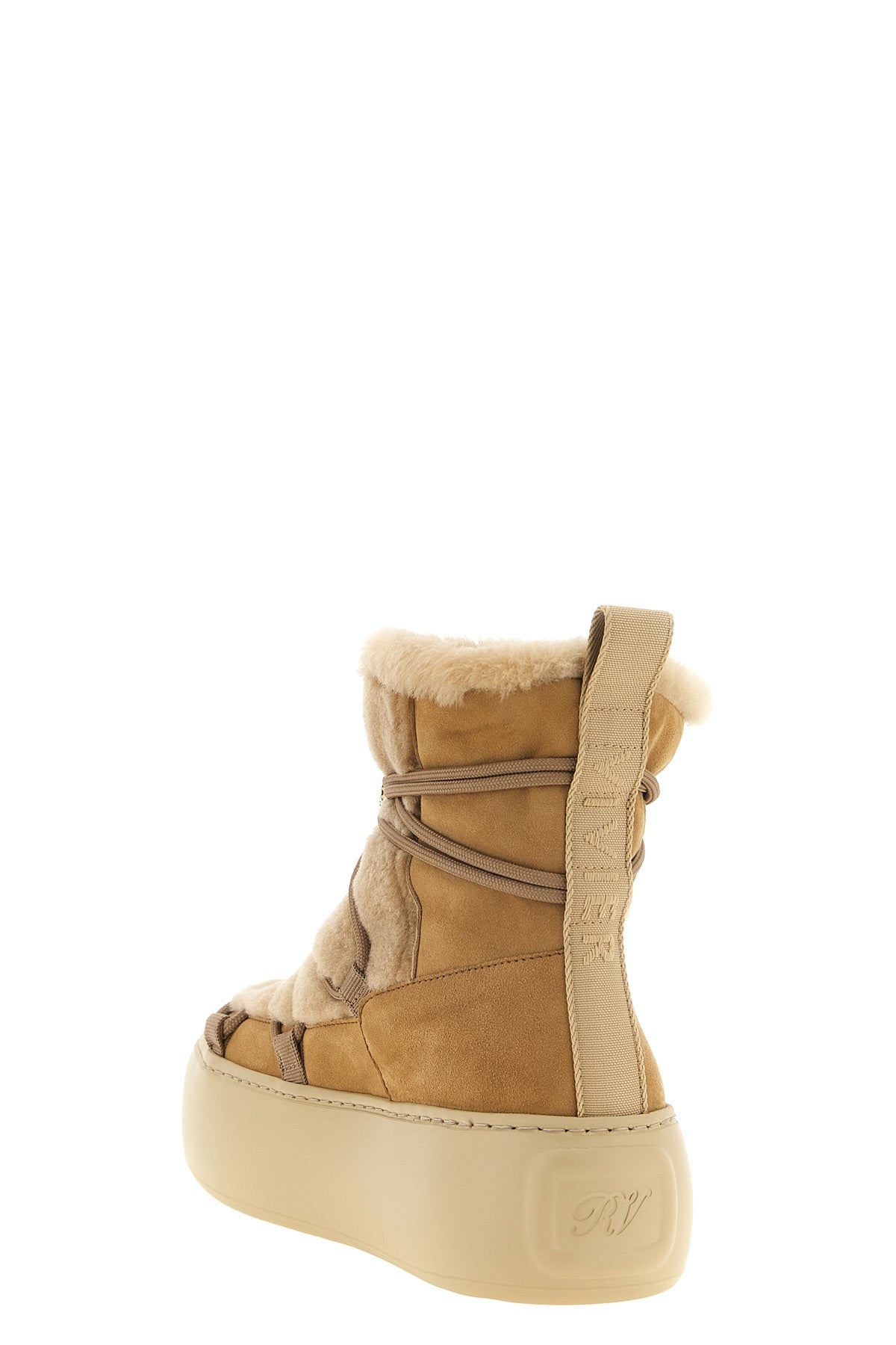 roger vivier viv up ankle boots redefine the winter silhouette through structu